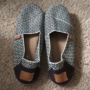 Madden Girl Black and white slip ons